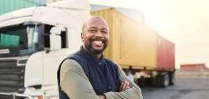 truck driver standing outside truck