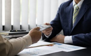 Handing Over Cash Advance